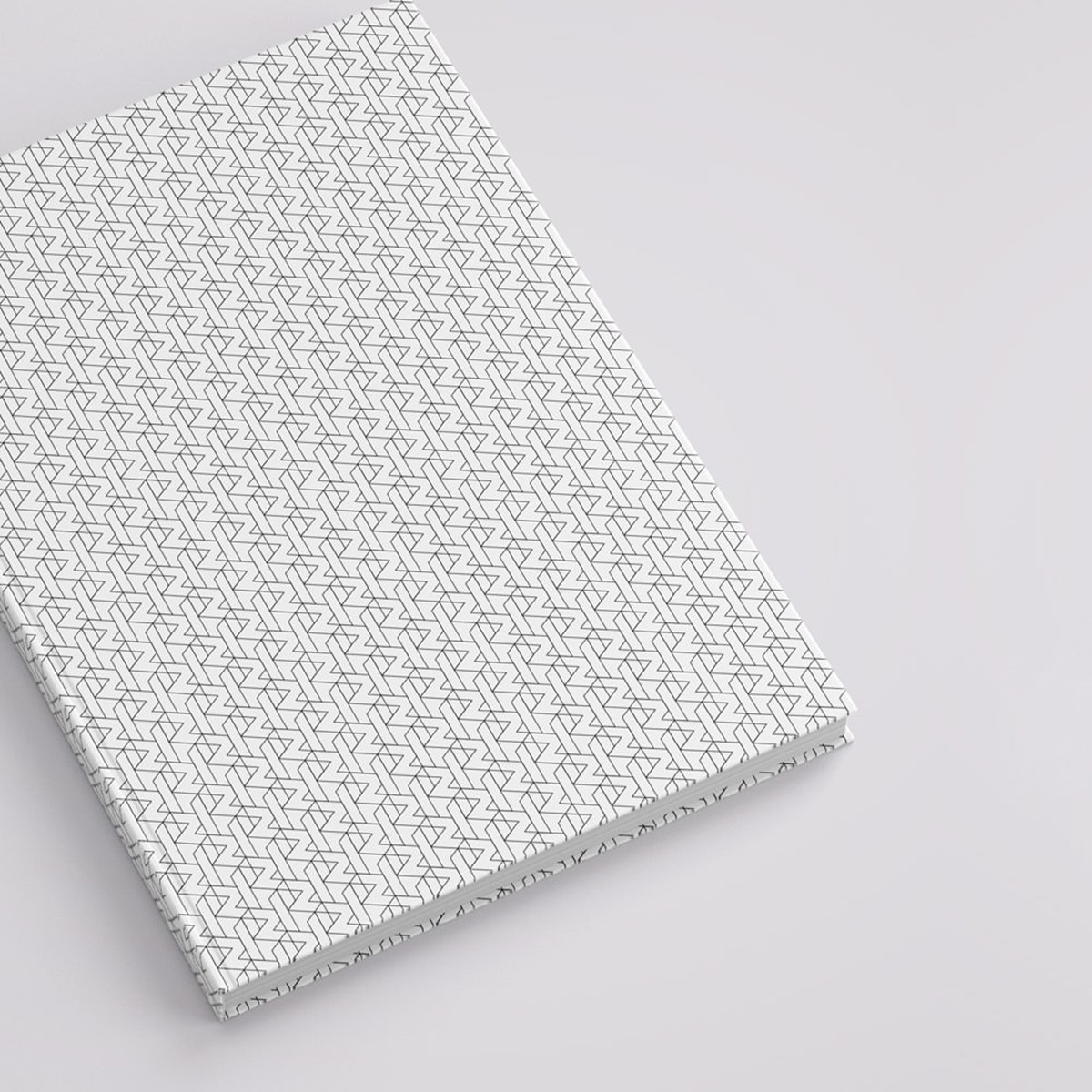Revere. Geometric pattern book cover mock-up. Brand identity design by Superfried. Manchester.
