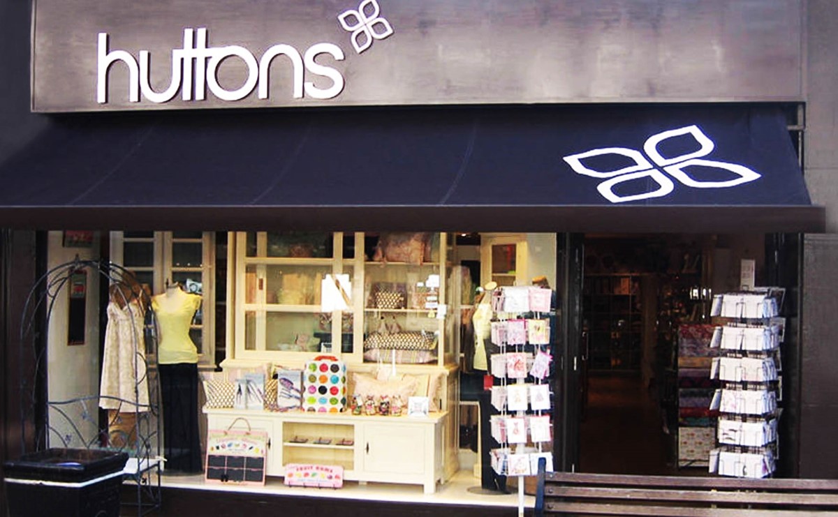 Huttons. Shopfront featuring new brand identity signage. Brand identity design by Superfried.