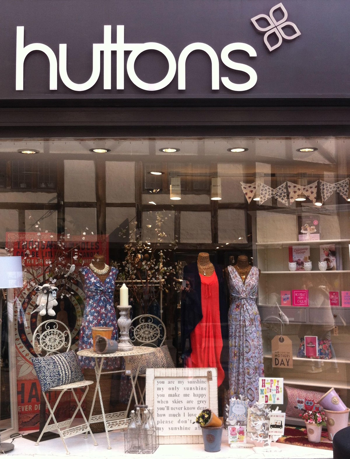 Huttons. Shopfront featuring new brand identity signage + palette. Design by Superfried. Manchester.