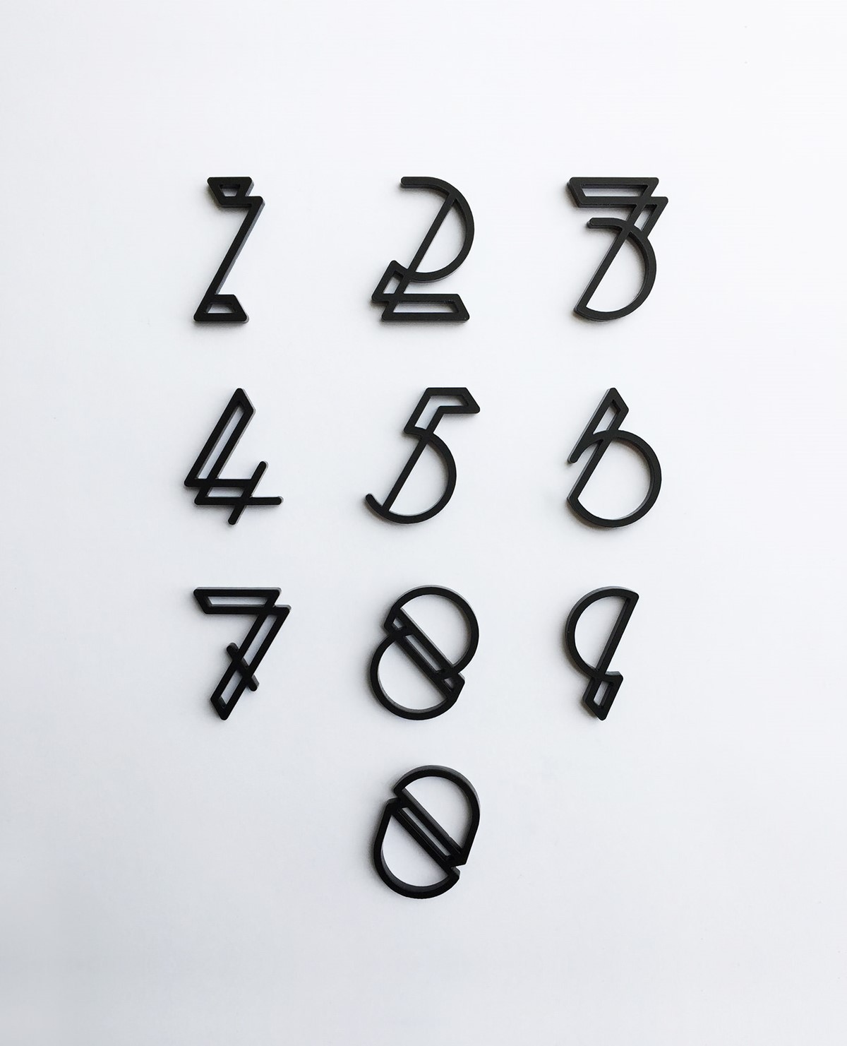 Flex. Fred Aldous. Experimental laser cut numerals. Typography design by Superfried.