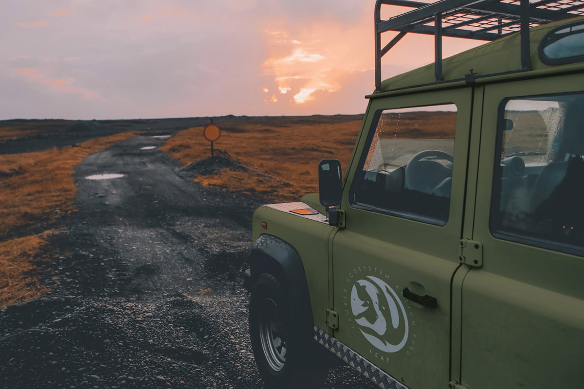 Leuser Ecosystem Action Fund [LEAF] logo on a green 4x4 Jeep mock-up. Client: DiCaprio foundation + Sumatran Orangutan Society [SOS].