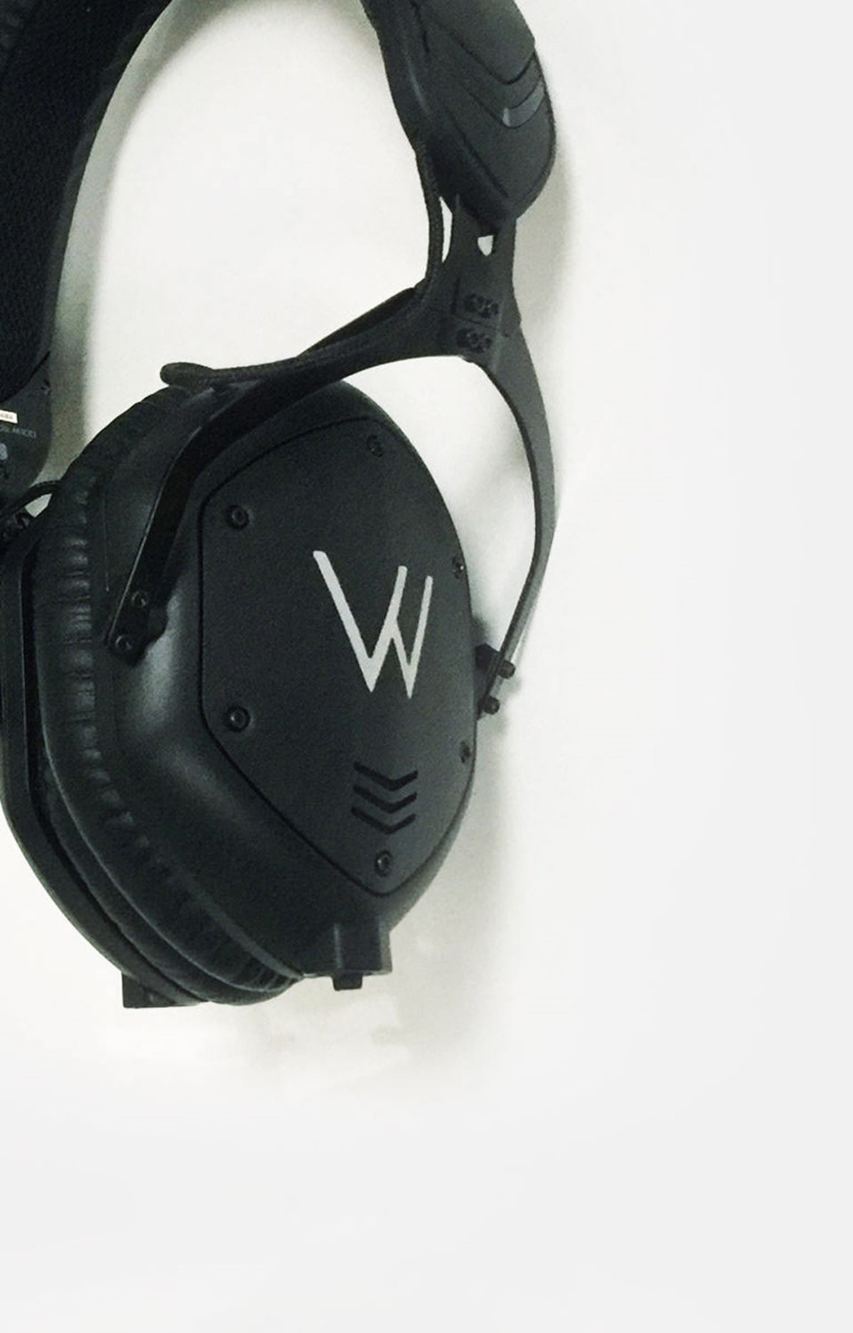 Will Clarke. Branded logo headphones. Brand identity design by Superfried.